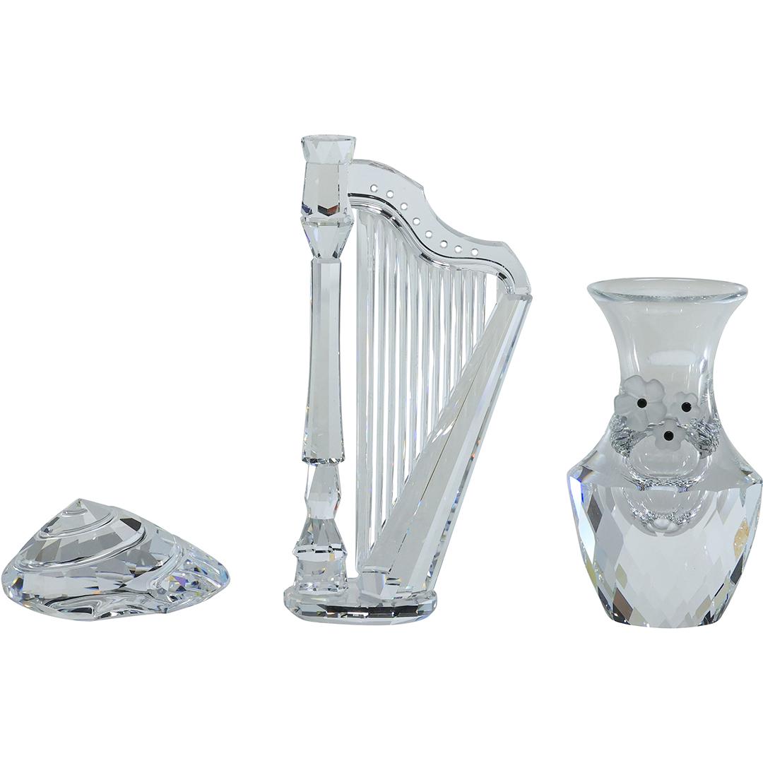 [3] Assorted Swarovski Faceted Crystal Glass: Harp, Vase, Shell: [3] Assorted Swarovski Faceted Crystal Glass: Harp, Vase, Shell. size: 4x2 (harp), 2.75x1.5 (vase), 1x1.75 (shell)