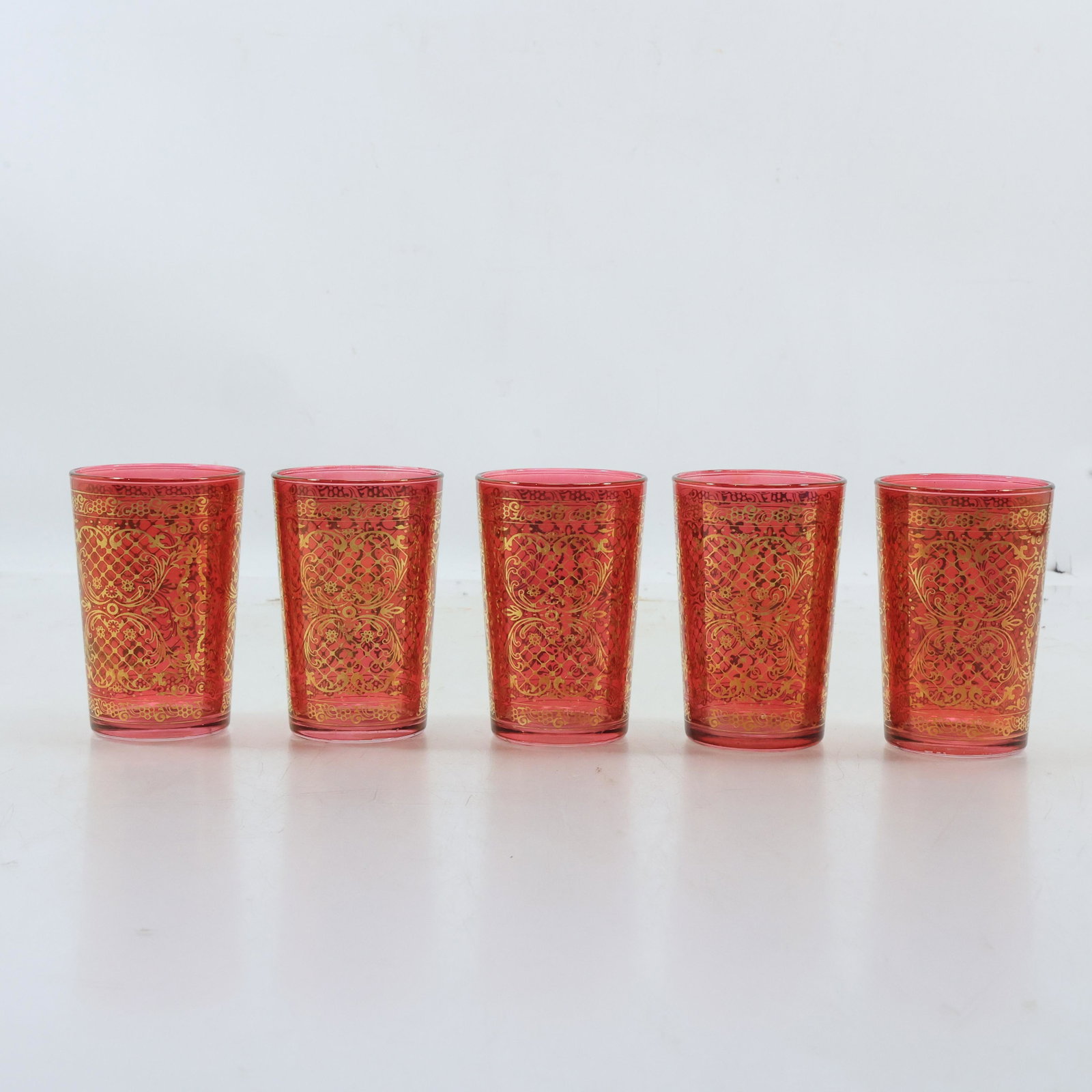 5 Mid-Century Modern Gold Trim on Red Glass Tumblers Italian Collezione Timon: 5 Mid-Century Modern Gold Trim on Red Glass Tumblers Italian Collezione Timon. size: 3.75x2.5 The auction house does not ship any items. We offer our local shipper Gravity Boxes to automatically send 