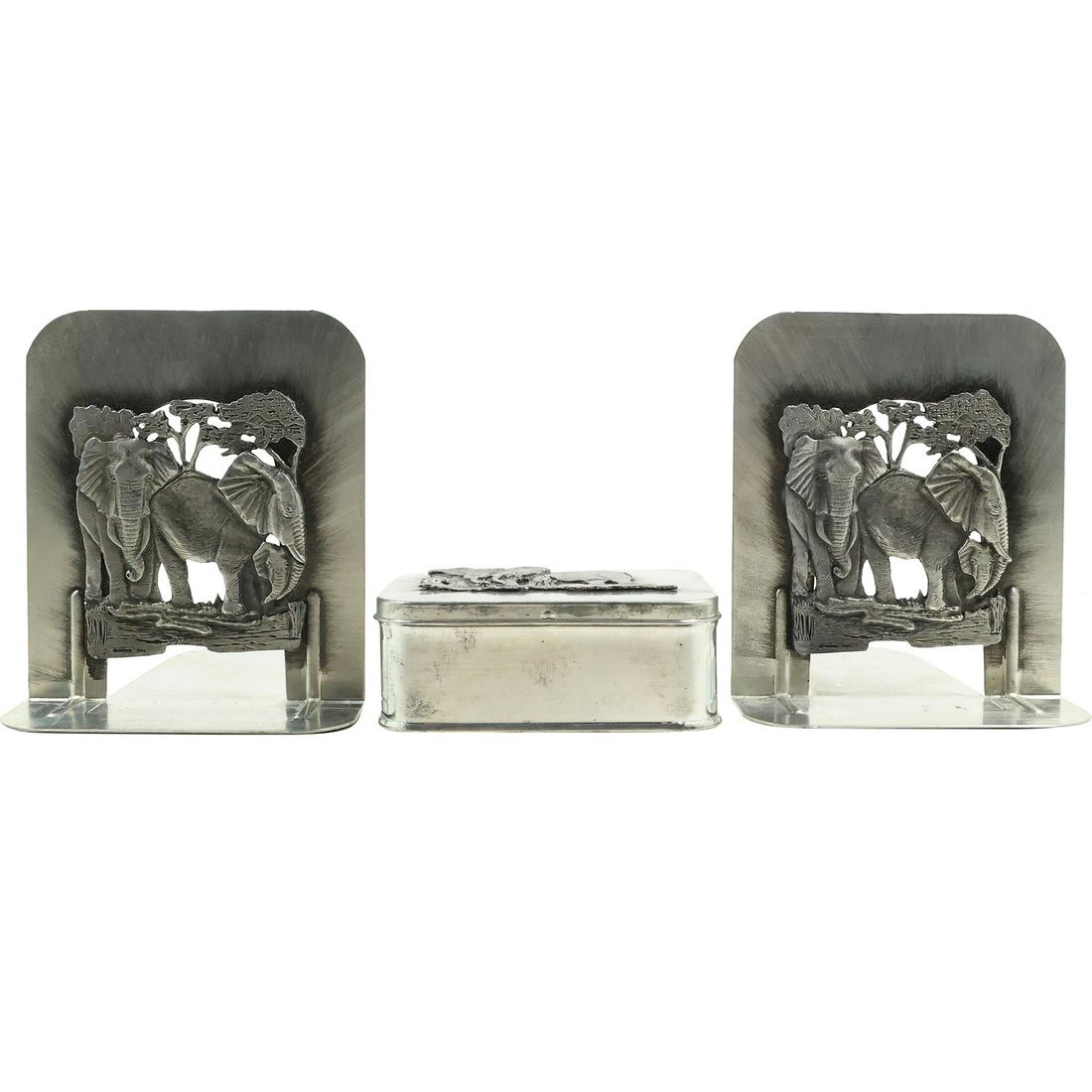3 Pc. Designs by Metzke Polished Pewter Elephants in the Wild Bookends and Trinket Box: 3 Pc. Designs by Metzke Polished Pewter Elephants in the Wild Bookends and Trinket Box. size: 5.5x4.75x6 (bookend), 1.75x4.5x3.25 (box)