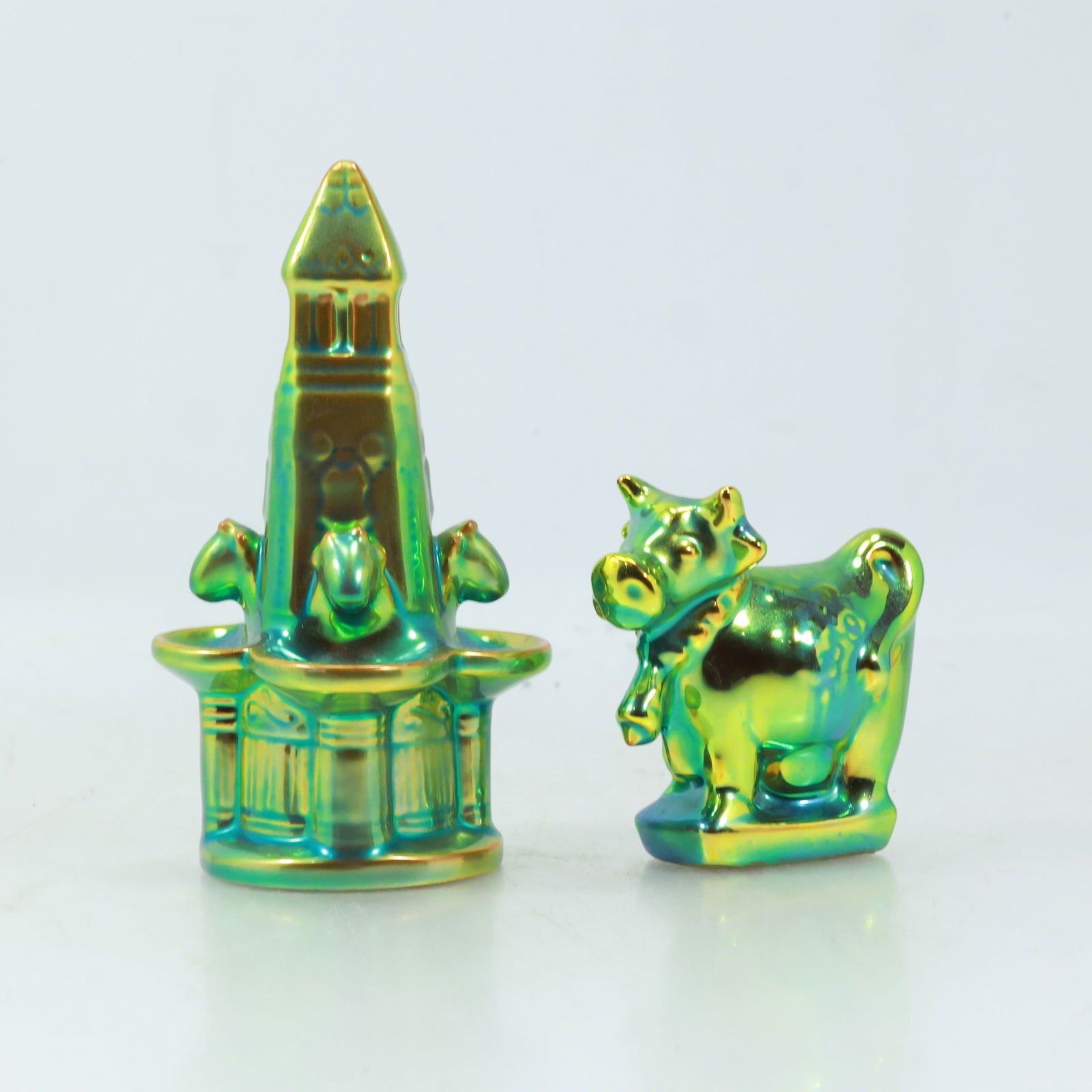 [2] ZSOLNAY Hungary Green Iridescent Pottery "Zsolnay Fountain" and "Cow": [2] ZSOLNAY Hungary Green Iridescent Pottery "Zsolnay Fountain" 5.5 inches height and "Cow" 3.25 inches height.
