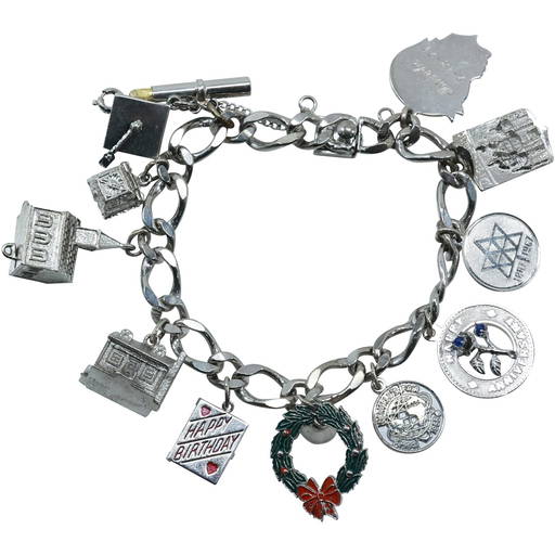 Sterling Silver Charm Bracelet With 11 Sterling Charms Weighs 45.3