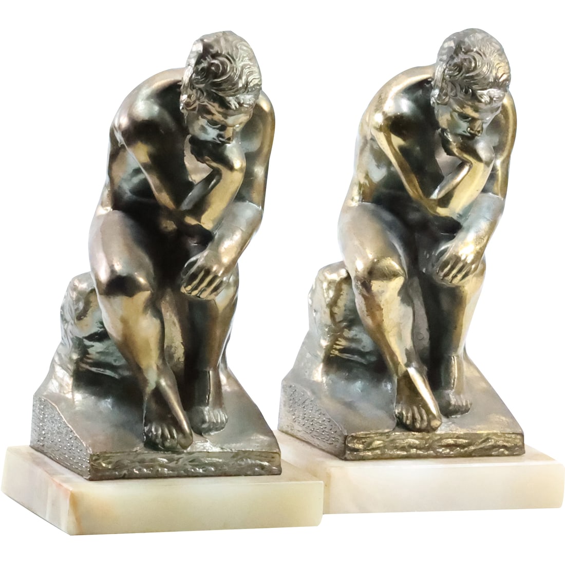 Pair Cast Metal Seated Nude Male Bookends on Marble Bases "The Thinker" 9.25 in. height: Pair Cast Metal Seated Nude Male Bookends on Marble Bases "The Thinker" 9.25 in. height. size: 9.25 in. x 5 in. x 4 in.