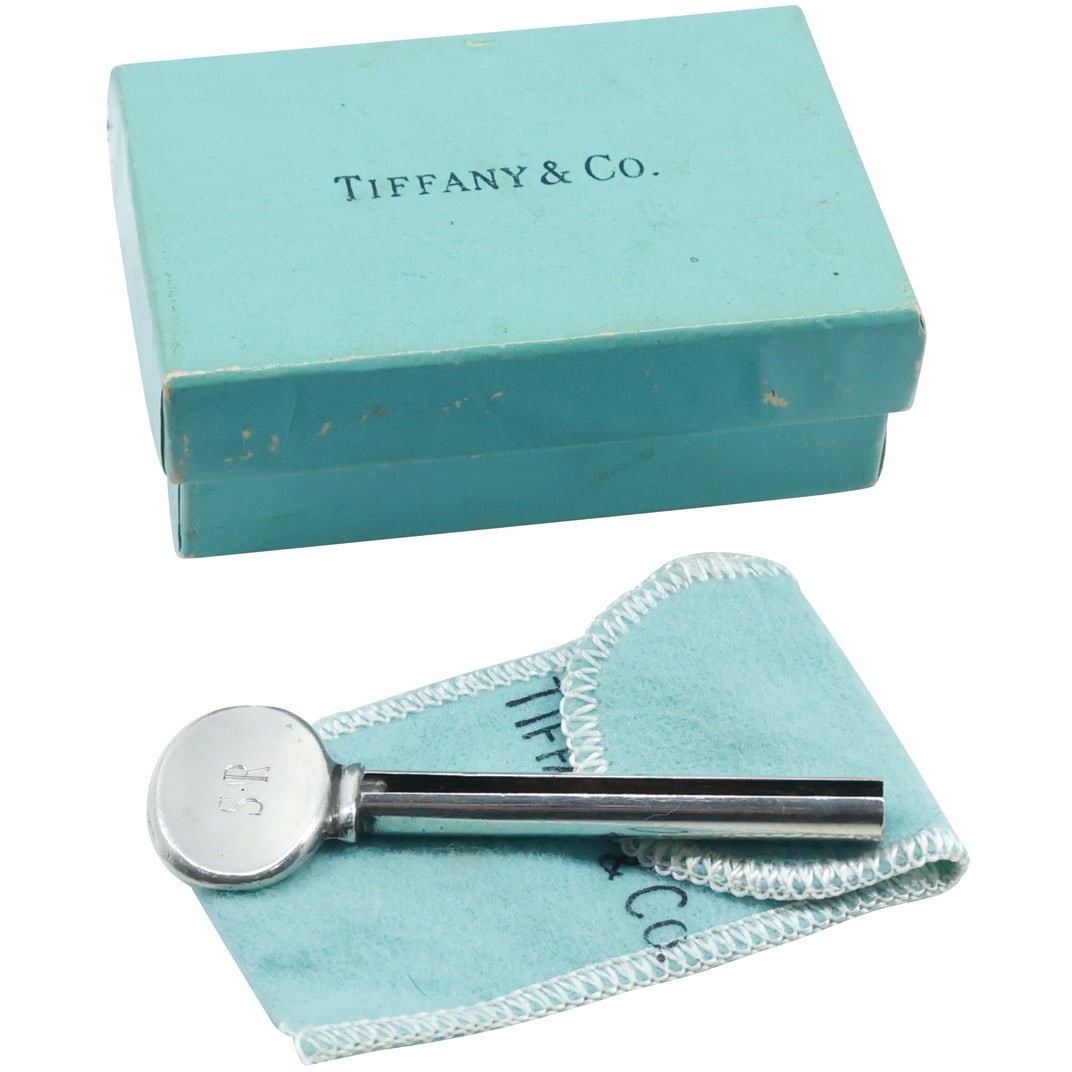 TIFFANY & CO Sterling Silver Toothpaste Key 3 in. x 1 in. with fabric pouch and box: TIFFANY & CO Sterling Silver Toothpaste Key 3 in. x 1 in. with fabric pouch and box 3 1/4 in. x 2 1/4 in. x 1 1/4 in.