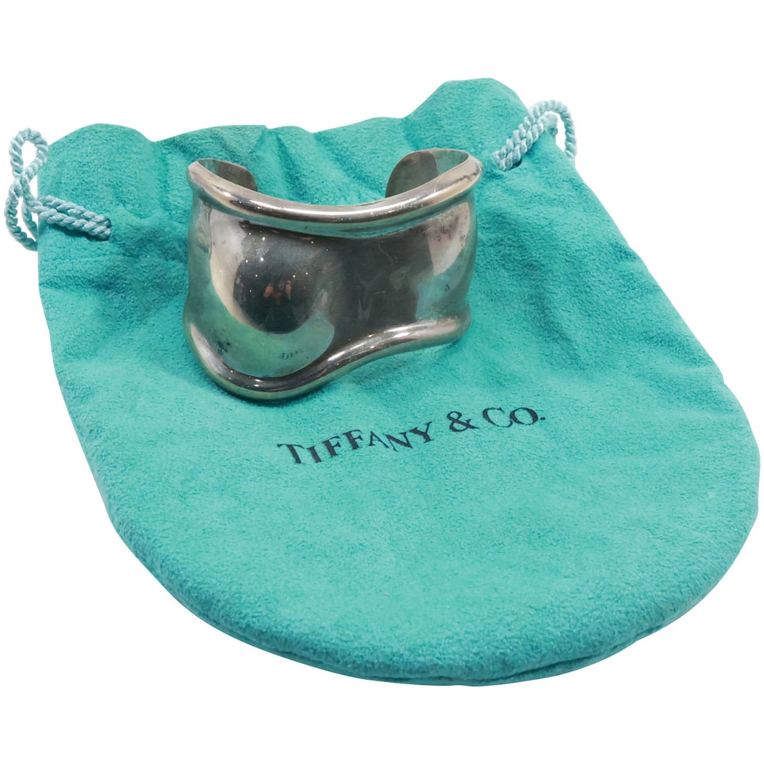 TIFFANY & CO Elsa Peretti Italy 1978 .925 Sterling Silver Wide Bone Cuff Bracelet 1 3/4 in. x 2 3/8: TIFFANY & CO Elsa Peretti Italy 1978 .925 Sterling Silver Wide Bone Cuff Bracelet 1 3/4 in. x 2 3/8 in. x 1 3/4 in. , weighs 53.6 grams, with fabric pouch