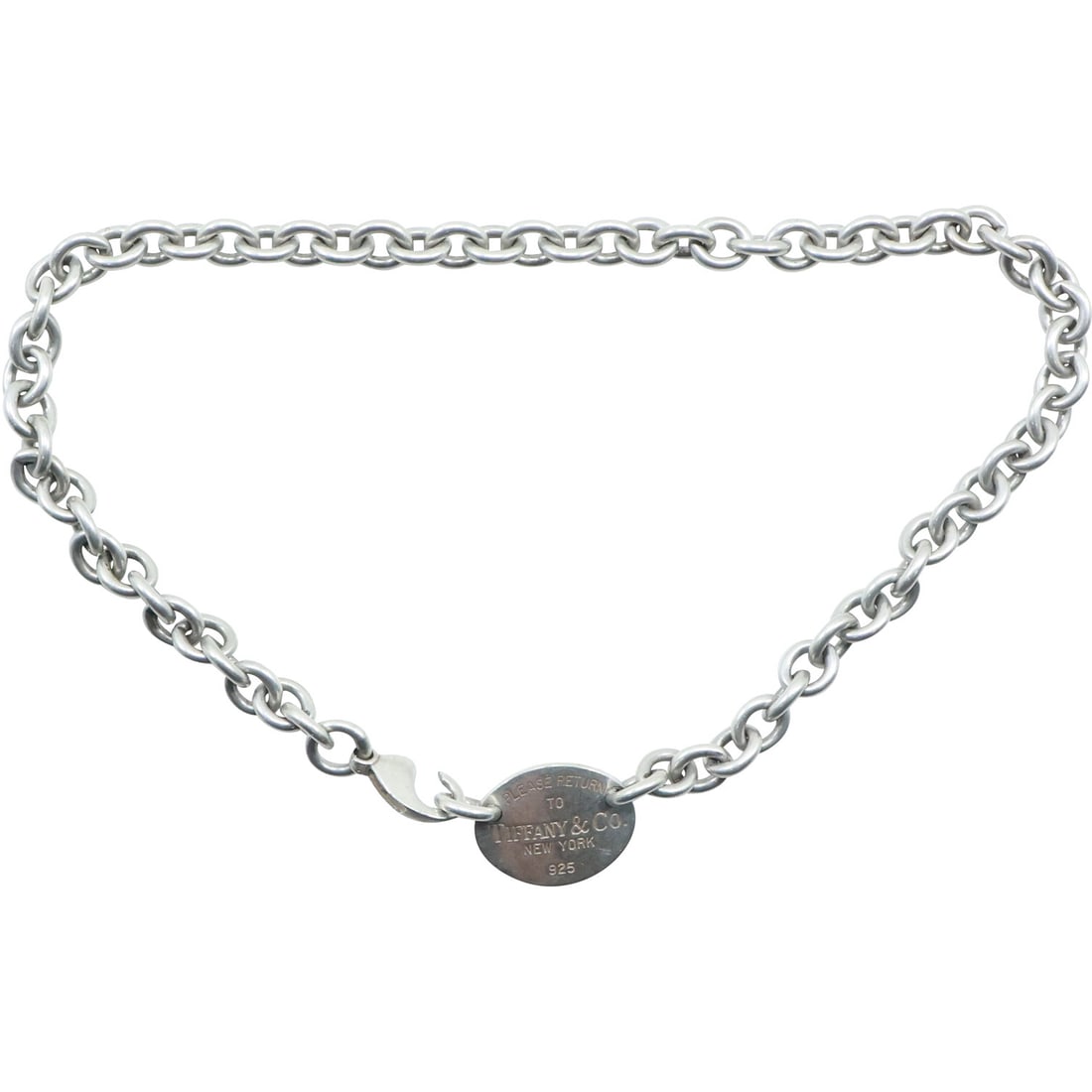 TIFFANY & CO .925 Sterling Silver Necklace "Please Return to Tiffany & Co New York" 15 inches: TIFFANY & CO .925 Sterling Silver Necklace "Please Return to Tiffany & Co New York" 15 inches x 3/4 in. x 3/8 in., Note: clasp is broken; with fabric pouch