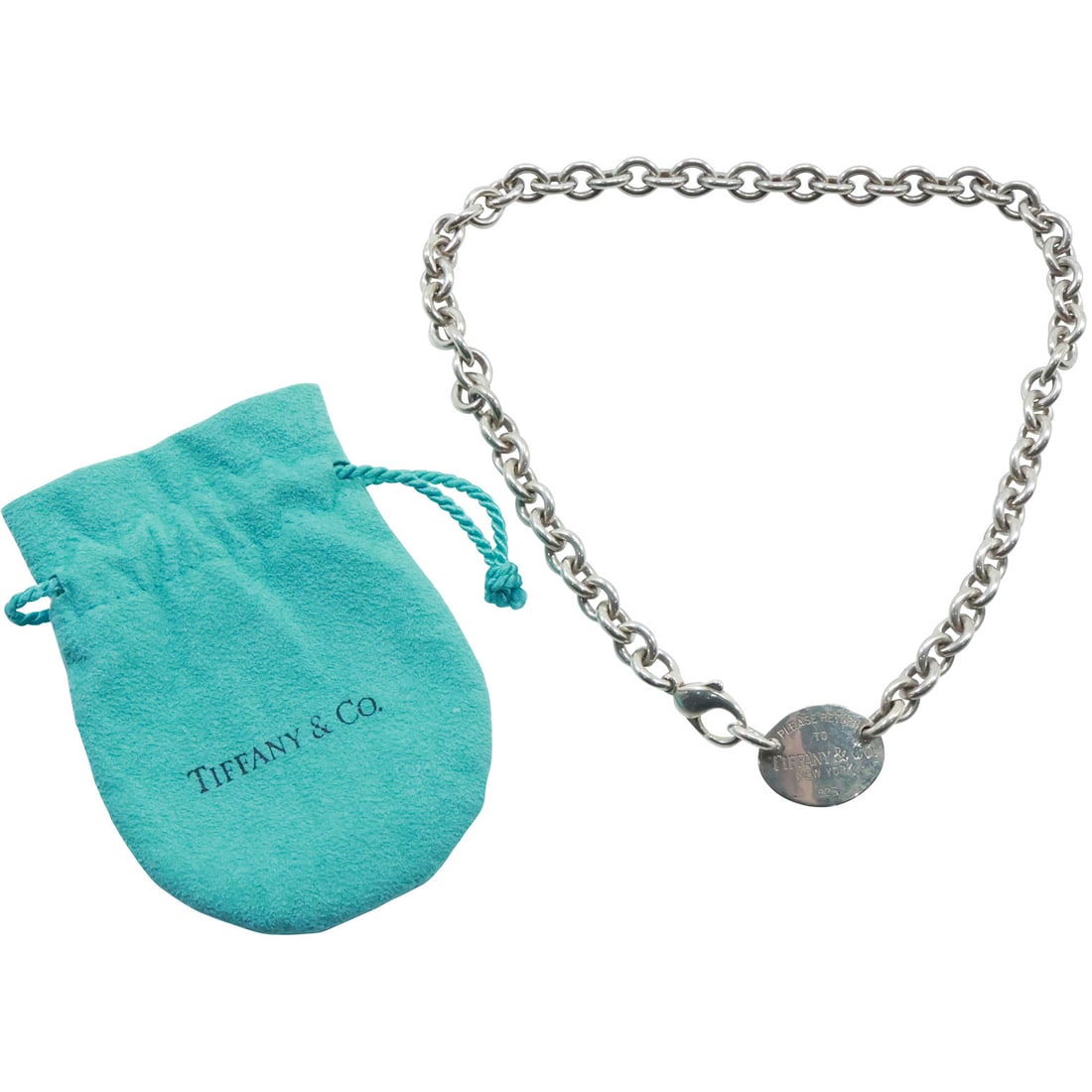 TIFFANY & CO .925 Sterling Silver "Please Return to Tiffany & Co New York" Oval Tag Necklace: TIFFANY & CO .925 Sterling Silver "Please Return to Tiffany & Co New York" Oval Tag Necklace 15 1/2 in. x 3/4 in.; with fabric pouch.