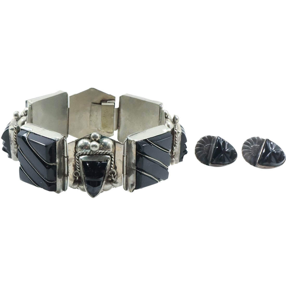 Sterling Silver Black Onyx Mayan Face Screw Back Earrings; Mexico Silver Black Onyx 8-Panel Bracelet: Sterling Silver Black Onyx Mayan Face Screw Back Earrings 7/8 in. x 5/8 in. ; Mexico Silver [not Sterling] Black Onyx 8-Panel Bracelet 8 in. x 1 in.
