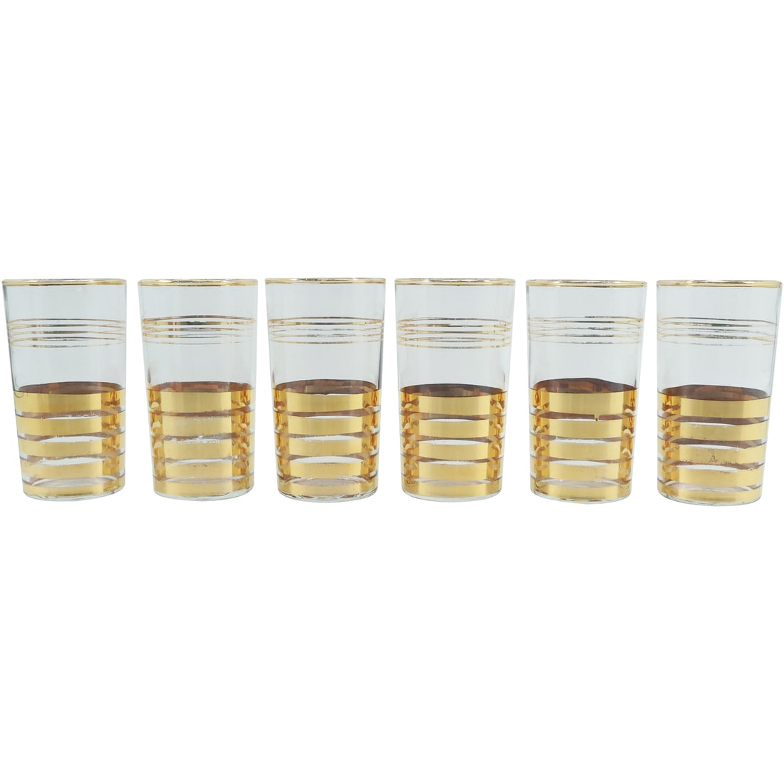 [6] Vintage 1940s Macbeth Evans Gold Striped Tumblers Barware: his set of vintage 1940s Macbeth Evans Gold Striped Tumblers represents a charming piece of mid-century barware. Macbeth Evans, a glassware company known for its innovative designs, produced these tum