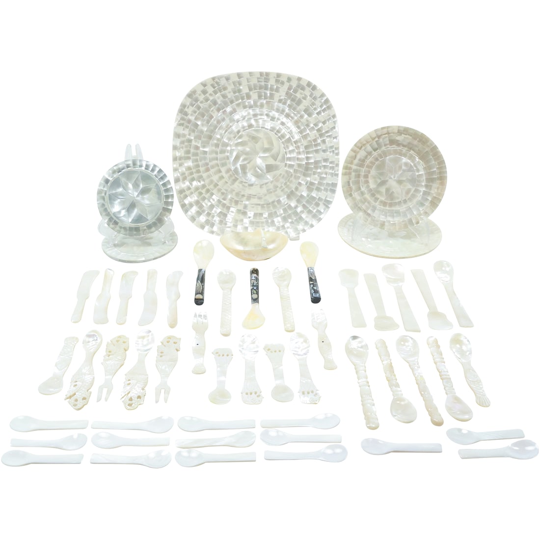 52 Pieces MOTHER OF PEARL Utensils, Plates, Cutlery, Basket, Coasters: This set comprises 52 pieces of Mother of Pearl utensils, including plates, cutlery, a basket, and coasters. The elegant pieces showcase the timeless beauty of Mother of Pearl, a material cherished fo