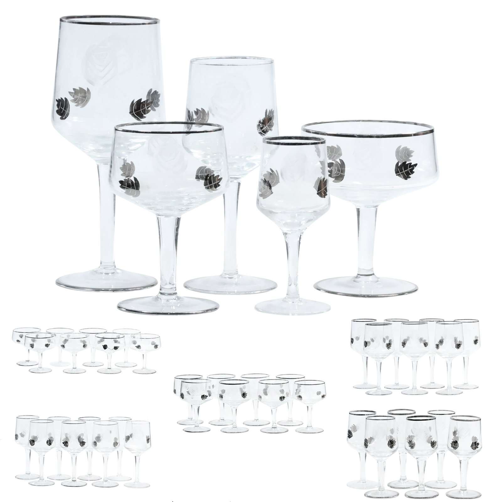 29 Assorted Cocktail Glasses Barware Etched Floral and Silver Leaf in Various Sizes: 29 Assorted Cocktail Glasses Barware Etched Floral and Silver Leaf in Various Sizes. size: 6x (4.5 x 2.), 8x (4.75 x 3), 8x (4.5 x 4), 8x (6.25 x 2.5), 7x (7.25 x 3)