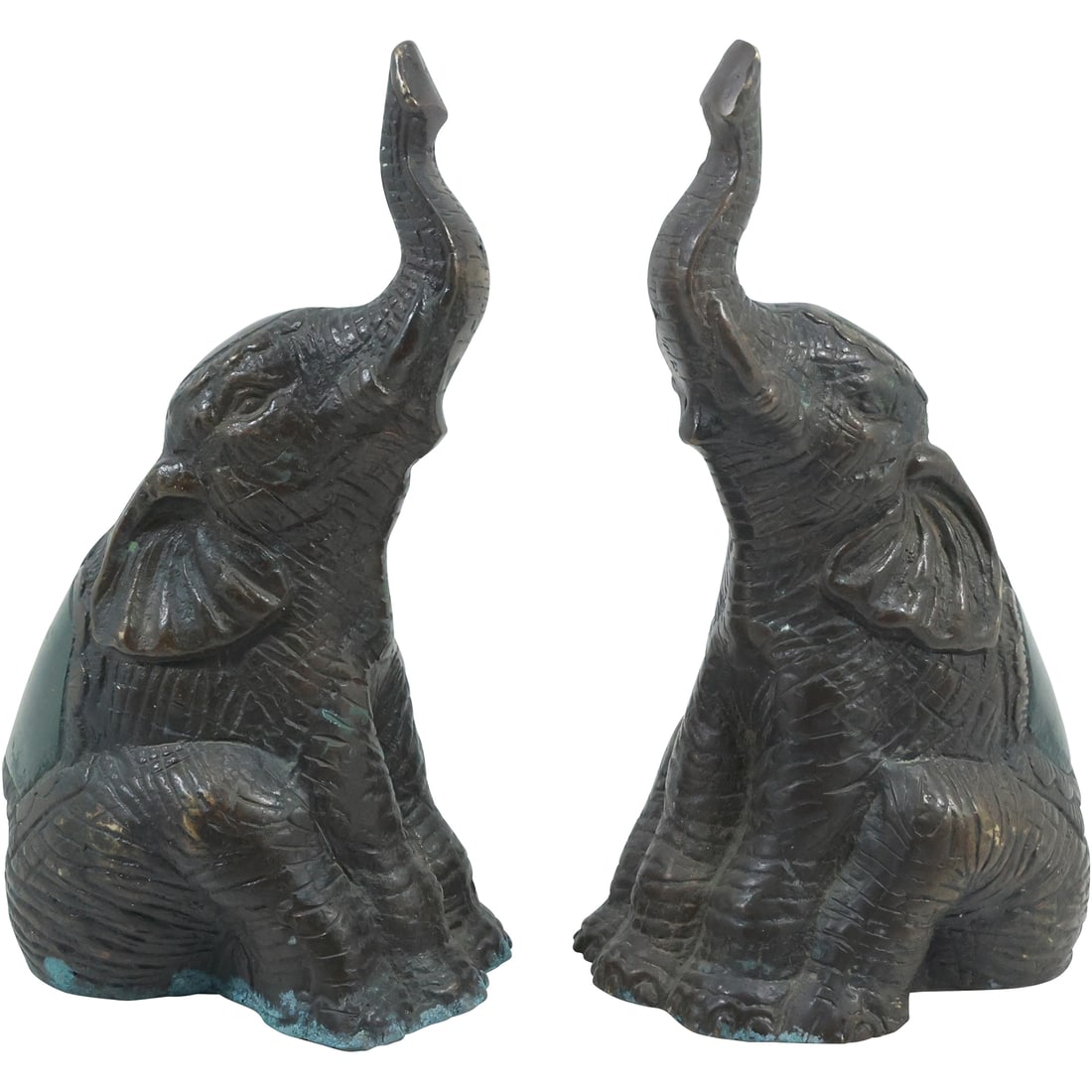 Vintage Cast Metal "Seated Elephants with Trunks Up" Bookends in Original Patina: Vintage Cast Metal "Seated Elephants with Trunks Up" Bookends in Original Patina. size: 8 in. x 4.5 in.