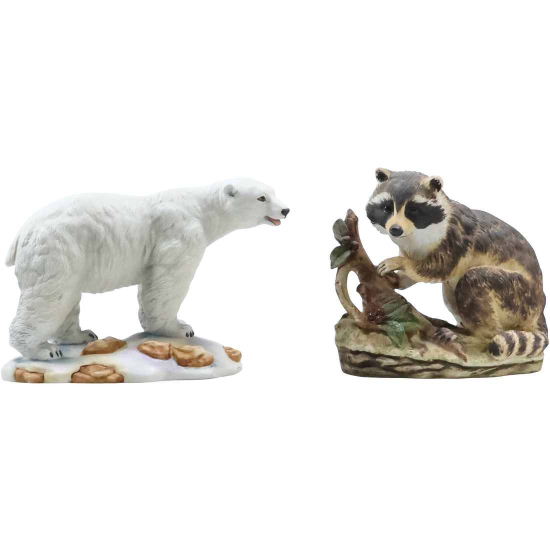 White Polar Bear and Raccoon Figures in Bisque Porcelain: White Polar Bear and Raccoon Figures in Bisque Porcelain size: bear (5 x 7.25 x 3), raccoon (5 x 5 x 3)