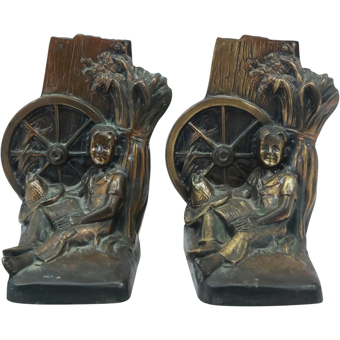1950's Brass Huckleberry Finn Bookends Philadelphia Manufacturing Co, original patina: 1950's Brass Huckleberry Finn Bookends Philadelphia Manufacturing Co size: 5x4x4.25