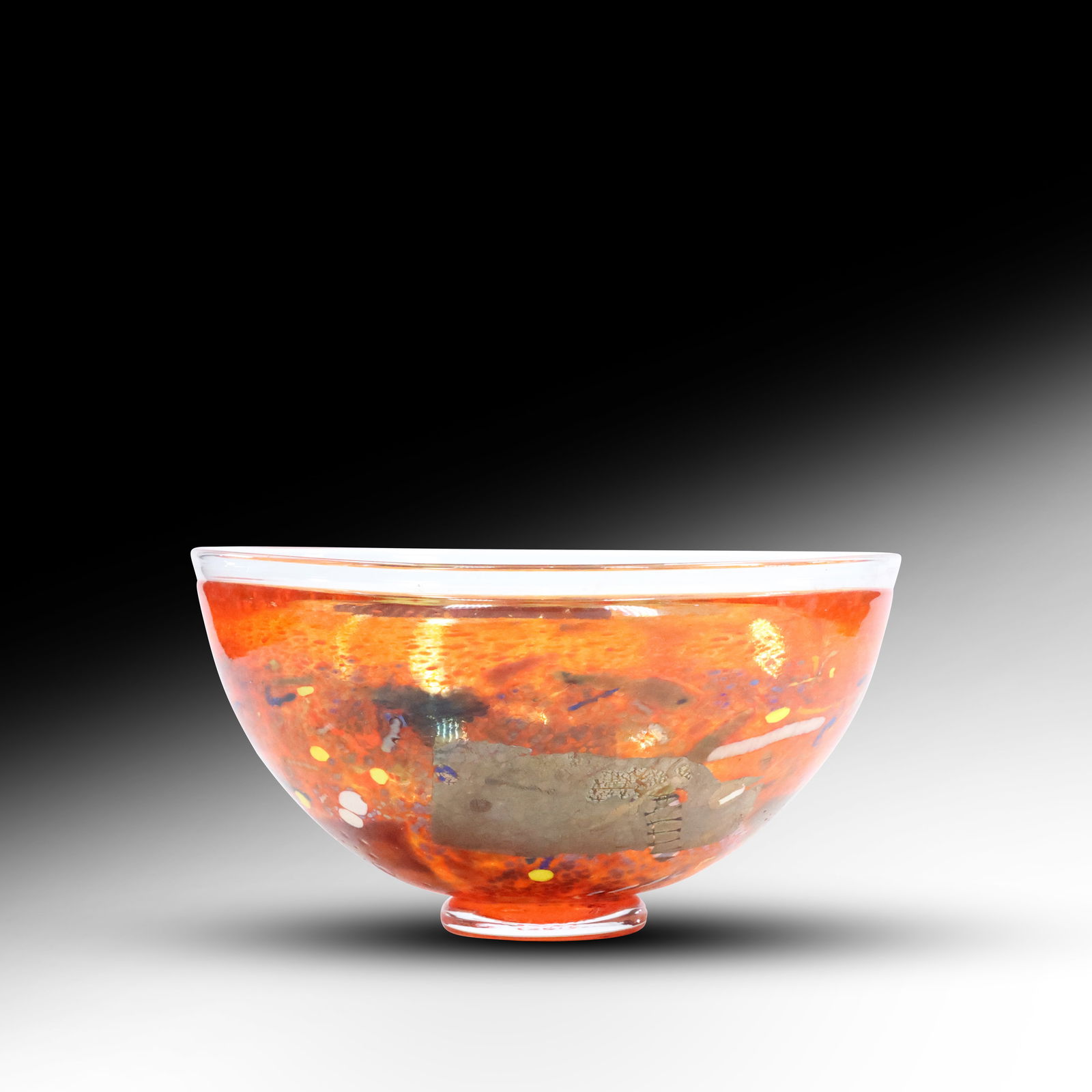 Signed Kosta Boda Orange Satellite Glass Bowl Bertil Signed B Vallien: This striking Kosta Boda "Satellite" Glass Bowl, designed and signed by renowned Swedish artist Bertil Vallien, is a captivating example of modern art glass. Known for his masterful use of color and i