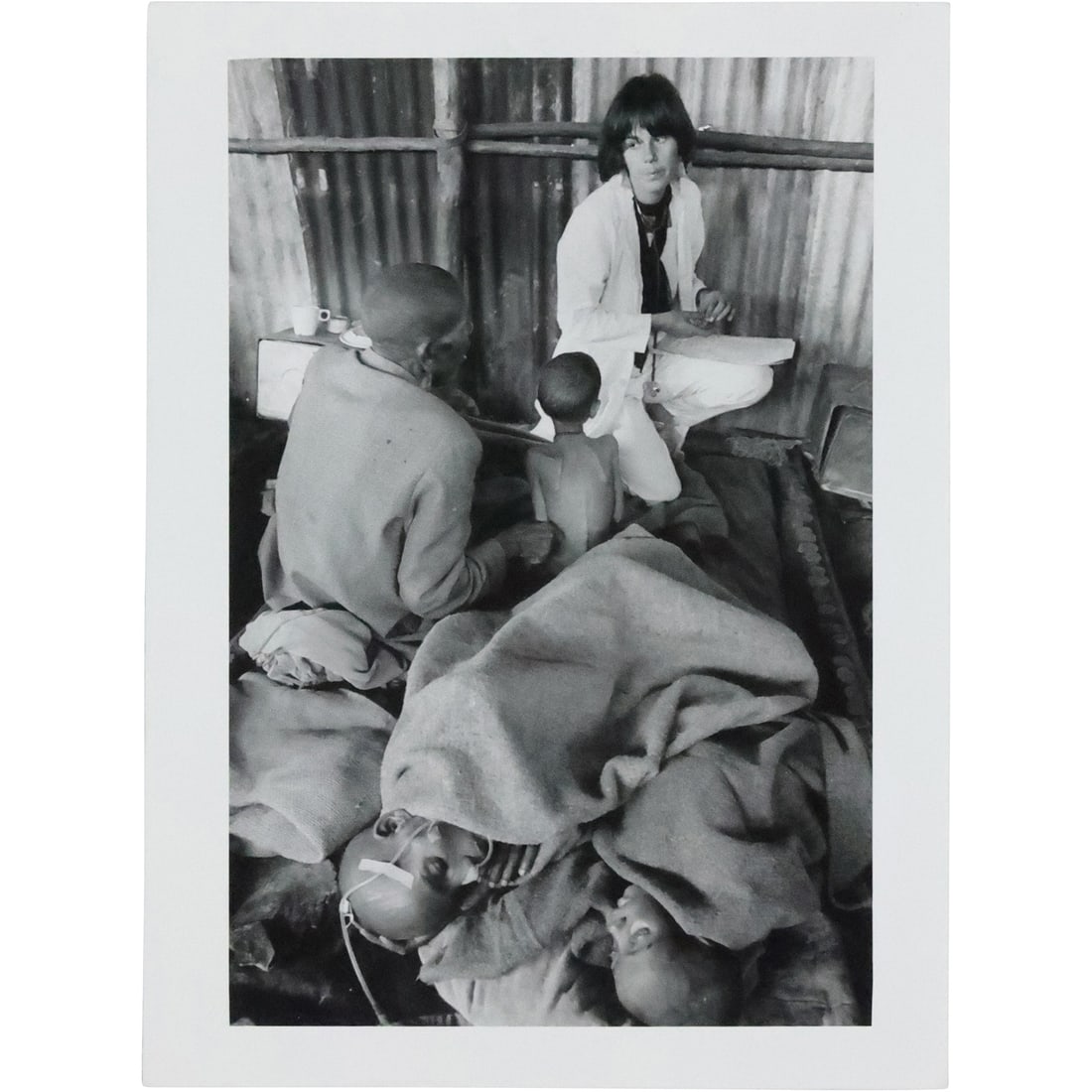Sebastia Salgado, Magnum Photos, Dr. Manuela Bertole Attenting to Refugees at Korean Camp (1 of 19)