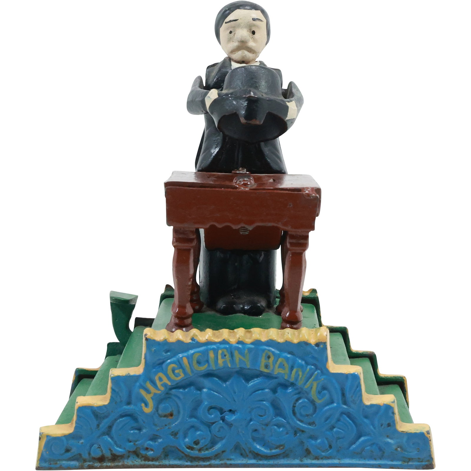 Novelty Cast Iron Magician Mechanical Bank in Original Paint Finish: Cast Iron Magician Mechanical Bank size: 7x6x3.5 shelf: A