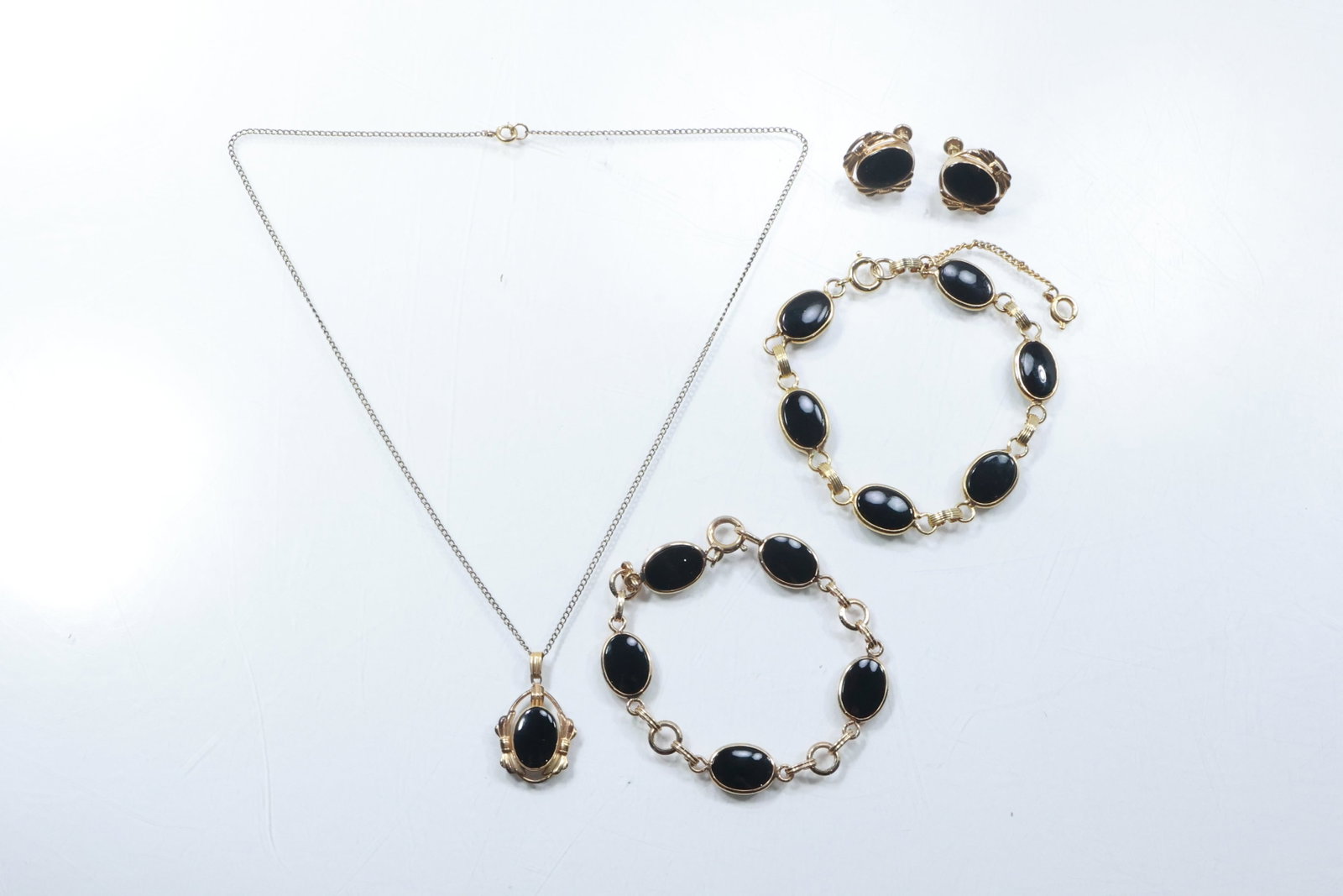12K GF Black Onyx Pendant Necklace; 2 Bracelets , Earrings: 12K GF Black Onyx Pendant Necklace 16 in.; 2 Bracelets , Earrings 5/8 in/ x 3/4 in.