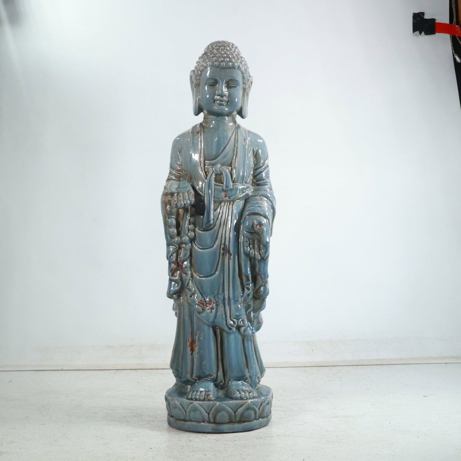34 inches height Majolica Pottery Buddha Figure Statue in Blue Glaze: 34 inches height Majolica Pottery Buddha Figure Statue in Blue Glaze. size: 34 x 10 x 6.5 between shelves