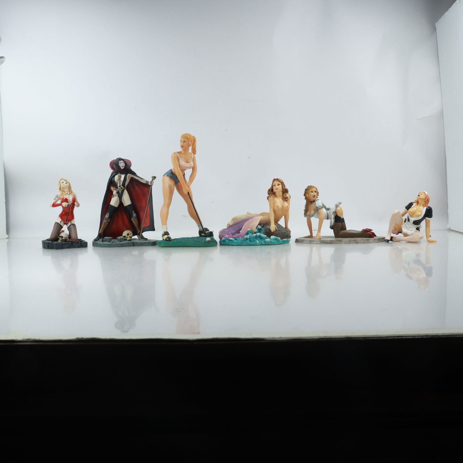 6 Assorted Fantasy Pin-up Girl Statues in Different Positions made of hard resin composition (1 of 19)
