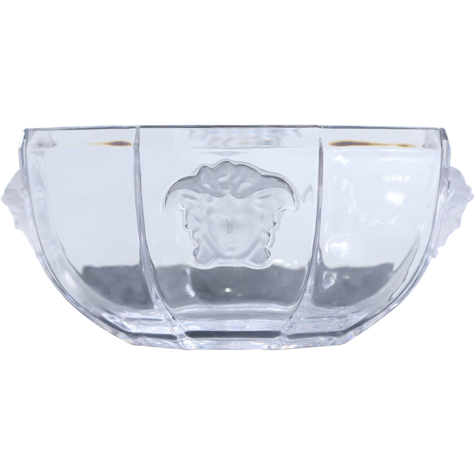 Rosenthal Versace Crystal "Lumiere" Bowl 7 in. diameter: A Rosenthal Versace crystal "Lumiere" patterned bowl. Composed of an overall octagonal form, embellished with frosted crystal Medusa heads. Marked along the underside: "Rosenthal Versace" size: 3.5 x