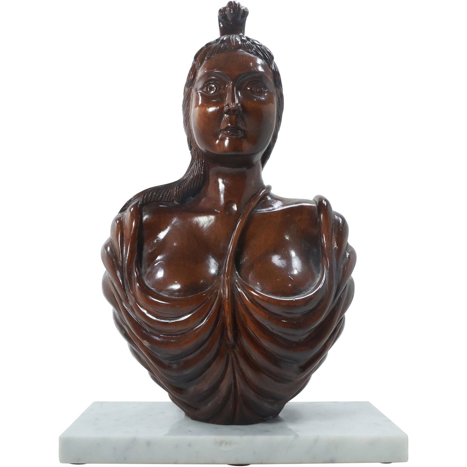 Carved and Polished Wood Bust of a Polynesian Princess Mounted on White Marble Base: carved and polished wood bust depicts a Polynesian princess, showcasing intricate details in her facial features and traditional attire. The wood has been carefully smoothed and polished, giving the s