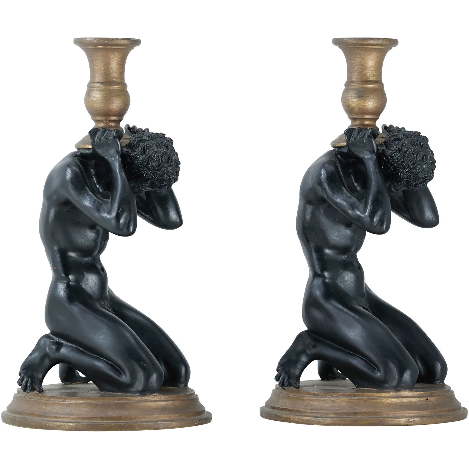 Pair of Atlas Style Candlesticks in Composite Material: Elevate your decor with this striking pair of Atlas-style candlesticks, each depicting a powerful figure in a kneeling pose, reminiscent of the Greek Titan Atlas, who bore the weight of the heavens on