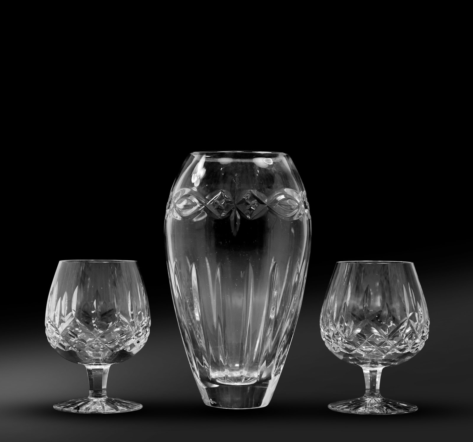 WATERFORD Crystal Glass Vase and 2 Crystal Glass Sherry Cocktail Glasses: WATERFORD Crystal Glass Vase and 2 Crystal Glass Sherry Cocktail Glasses. Size: 9 x 5 glasses: 5 x 4 Shelf: C