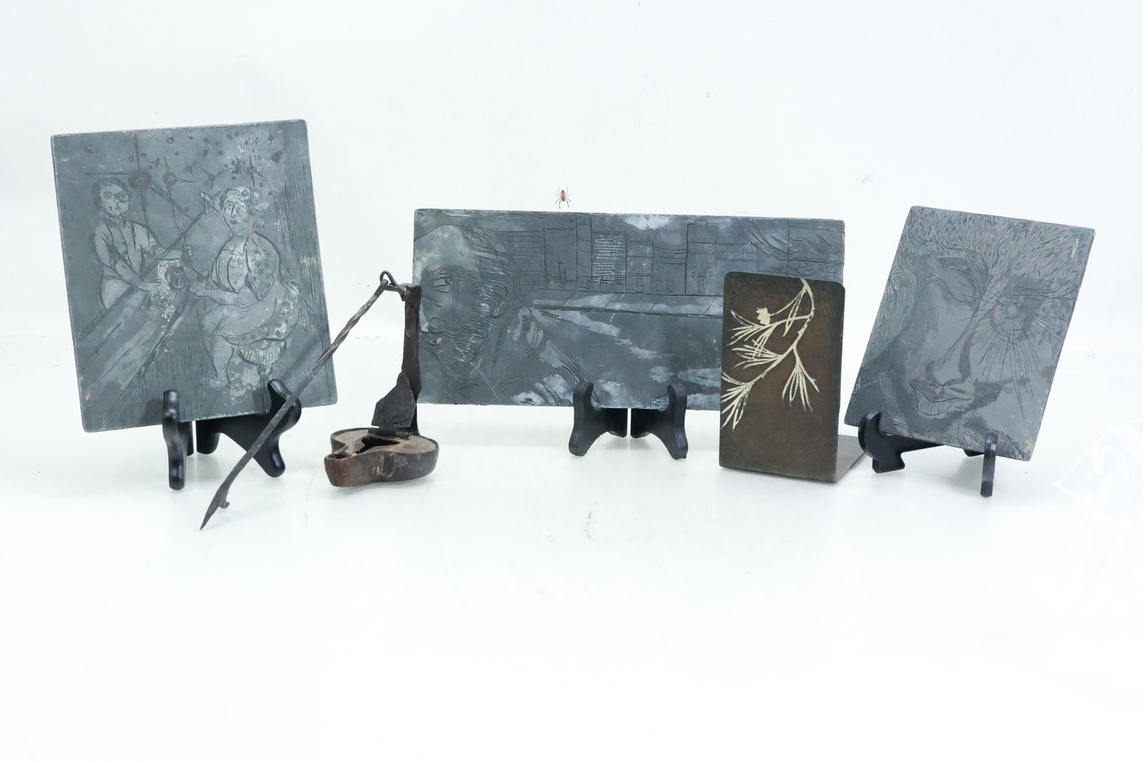 Antique Oil Lamp, Print Blocks, Sterling on Bronze Arts and Crafts Single Bookend: Antique Oil Lamp, Print Blocks, Sterling on Bronze Arts and Crafts Single Bookend; sizes range 5.5 in. to 14 in. **Important Pick-Up Information: Lots 1-100 are located at our Auction Gallery at 174 G