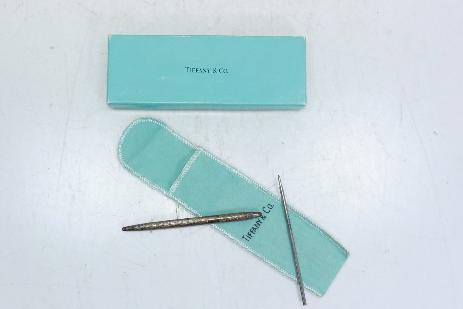 Tiffany & Co. Sterling Silver Pen in Box: Tiffany & Co. Sterling Silver Pen in Box. size 6 in. **Important Pick-Up Information: Lots 1-100 are located at our Auction Gallery at 174 Glasco Turnpike, Saugerties, NY 12477. Pick-up for these item