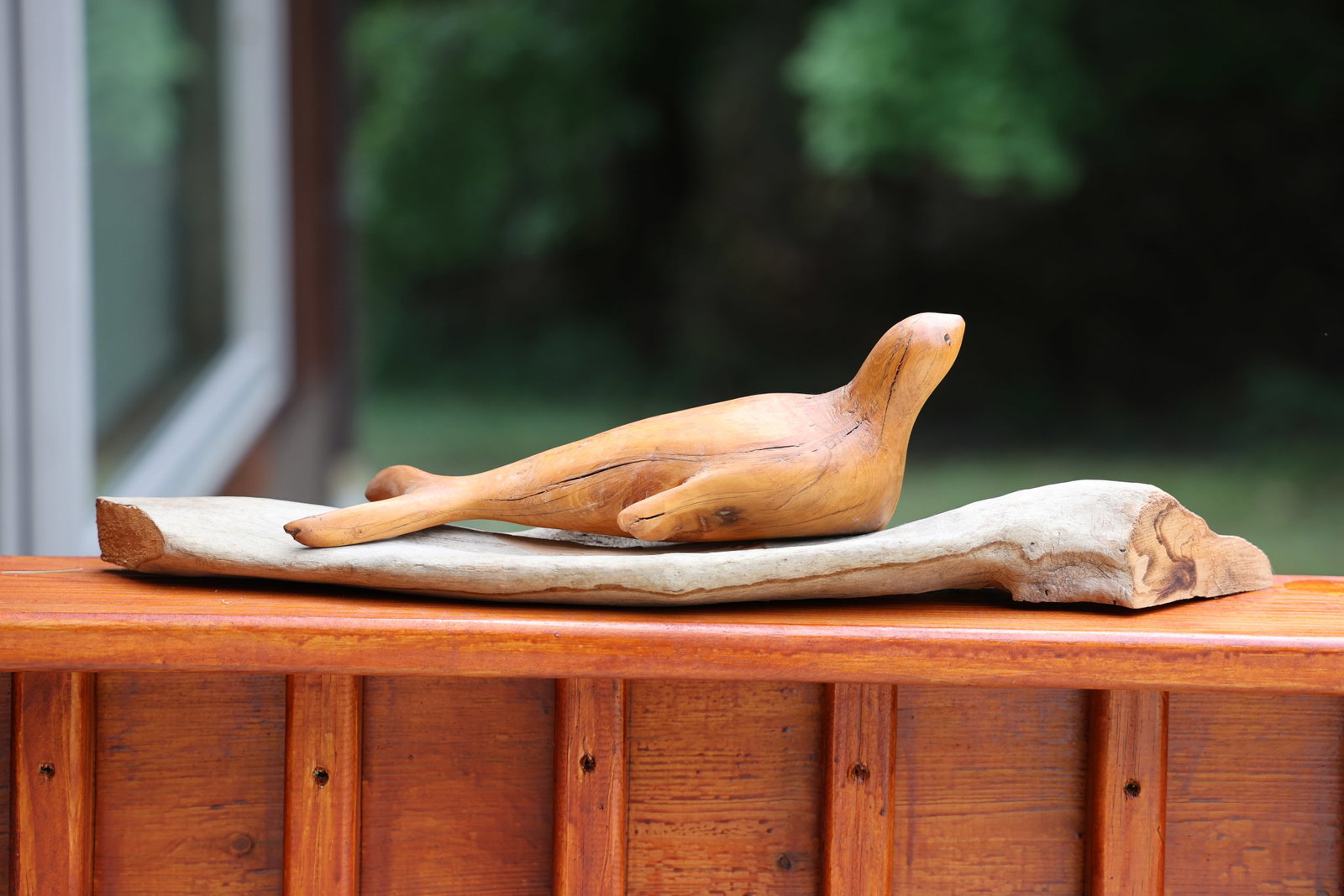 Natural Carved Wood Otter Sculpture 21 inches length x 5 in. height: Natural Carved Wood Otter Sculpture 21 inches length x 5 in. height **Important Pick-Up Information: Lots 1-100 are located at our Auction Gallery at 174 Glasco Turnpike, Saugerties, NY 12477. Pick-up