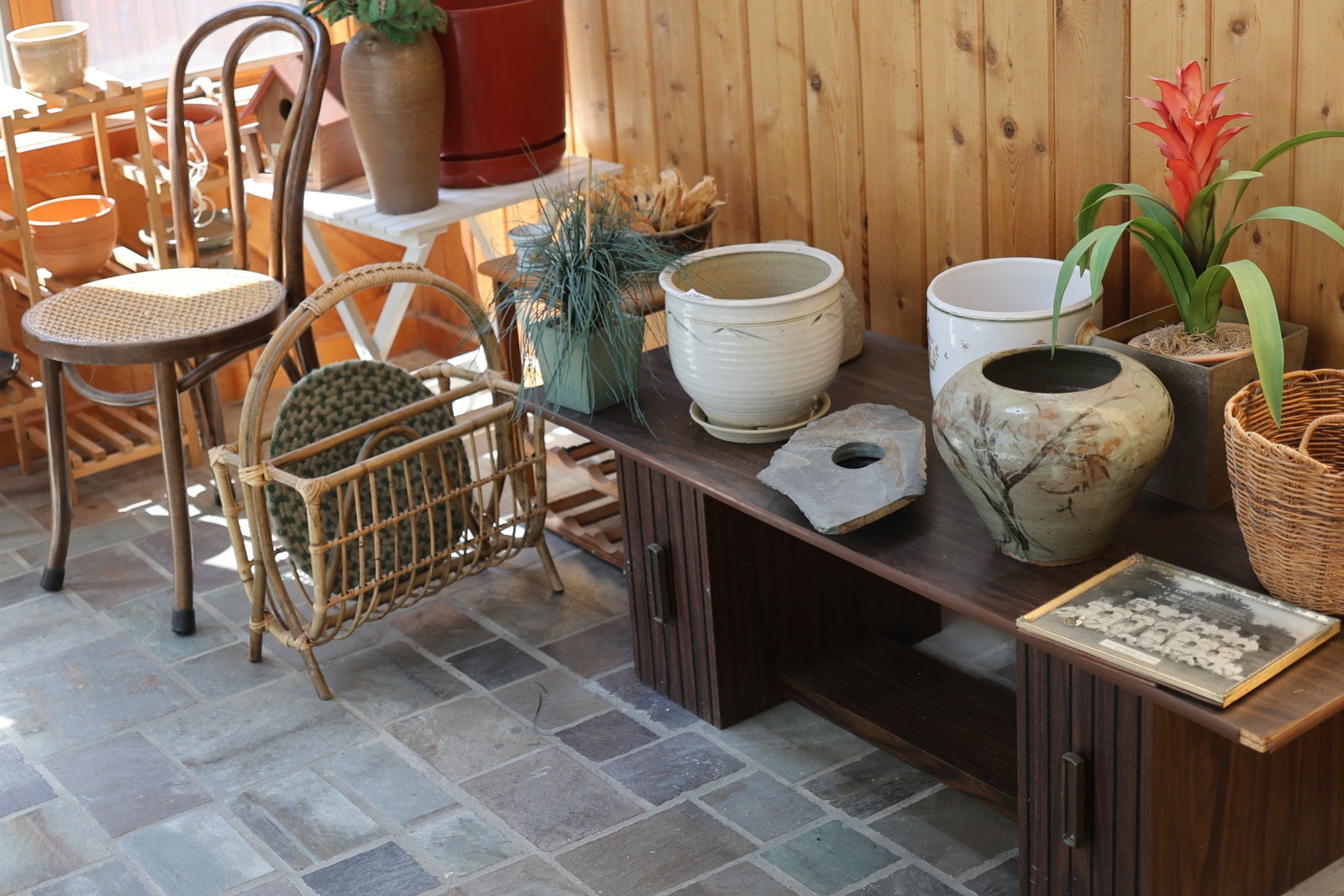 On Patio: Grouping Plant Pots, Stands, Side Chair, Magazine Stand, Etc: On Patio: Grouping Plant Pots, Stands, Side Chair, Magazine Stand, Etc. **Important Pick-Up Information: Lots 1-100 are located at our Auction Gallery at 174 Glasco Turnpike, Saugerties, NY 12477. Pic