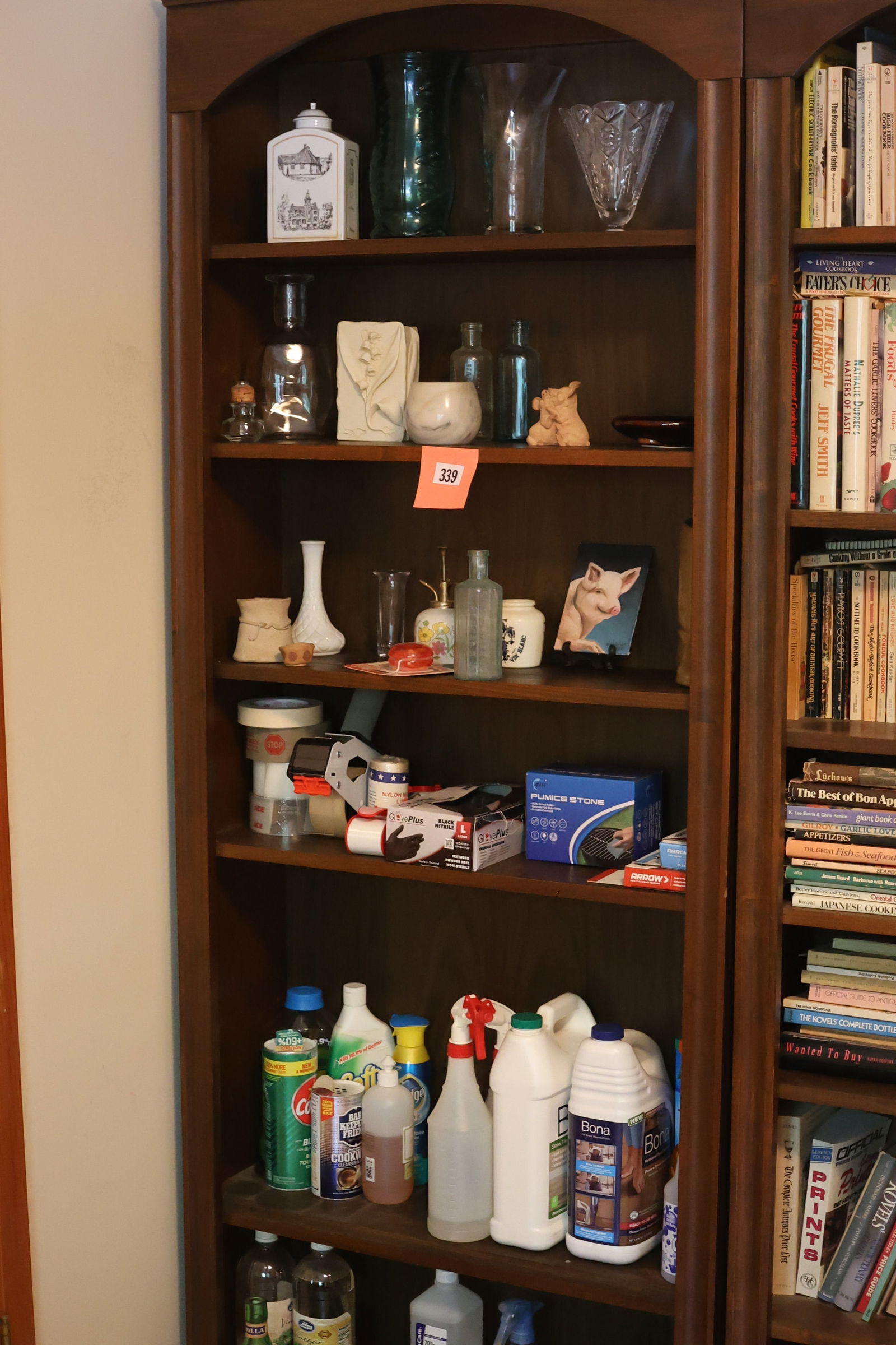 Foyer: Contents of Left Bookcase: Glassware, Vases, Bitter Bottle, Household Cleaning SEE PICTURES (1 of 4)