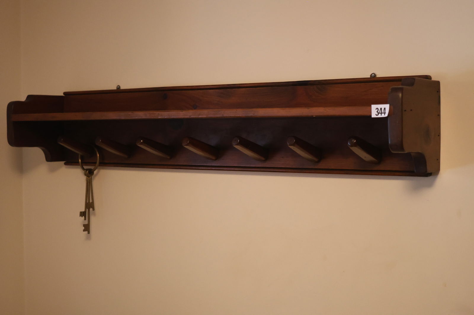 Foyer: Pine Wall Mount Coat Rack with Ring of Brass Keys  48 in. length x 9 in. (1 of 3)