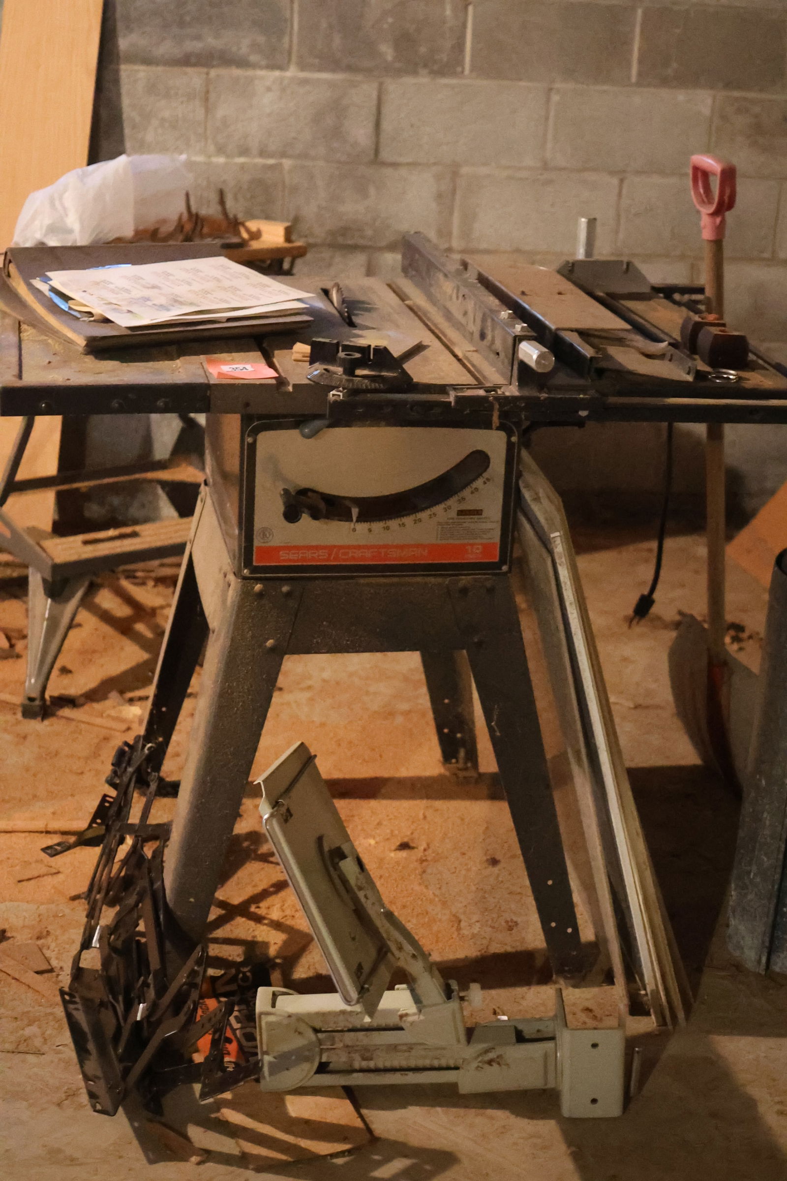 Basement: Table Saw and Misc.: SEE PICTUES - TAKE WHAT YOU WANT, LEAVE UNWANTED: Basement: Table Saw and Misc.: SEE PICTUES - TAKE WHAT YOU WANT, LEAVE UNWANTED FOR DUMPSTER **Important Pick-Up Information: Lots 1-100 are located at our Auction Gallery at 174 Glasco Turnpike, Saug