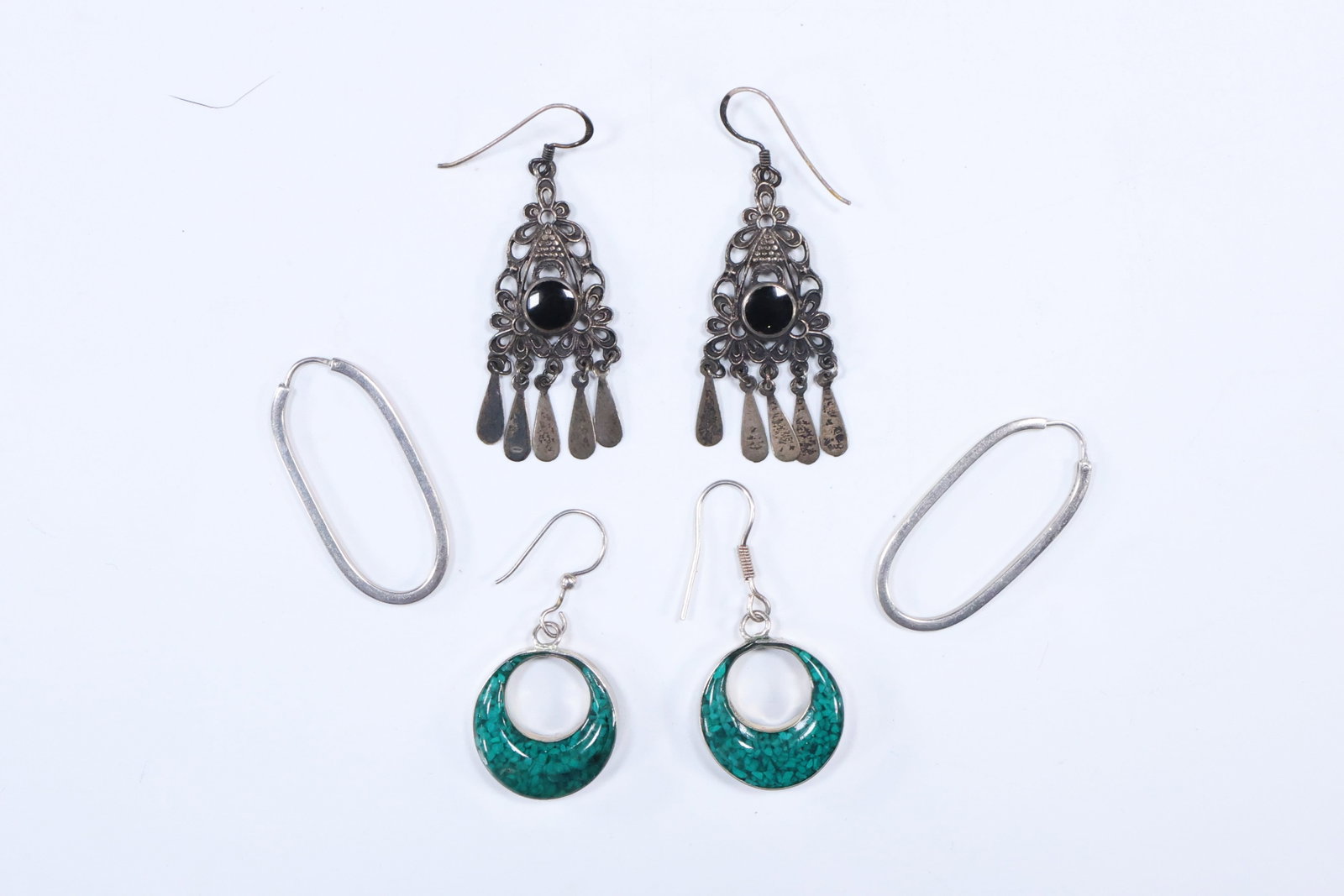 Sterling Silver with Malachite on one side, Black Onyx on other side Hoops Earrings; .925 Sterling: Sterling Silver with Malachite on one side, Black Onyx on other side Hoops Earrings 1 7/8 in. x 1 in.; .925 Sterling with Black Onyx Stone 5-Fringe Drop Earrings 2 3/8 in. x 7/8 in.; .925 Sterling Elo