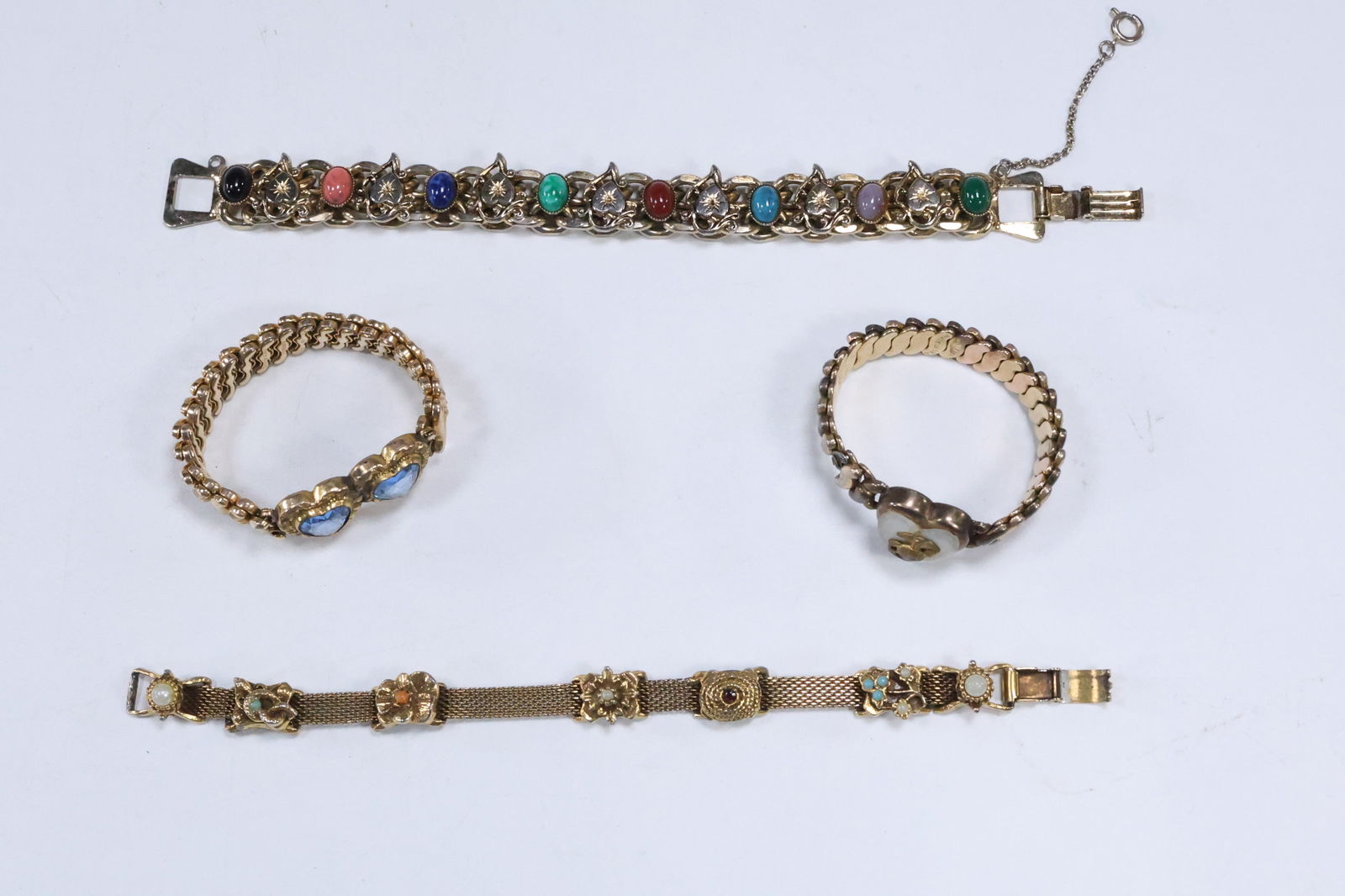4 Assorted Vintage Gold Tone Bracelets: Hearts repeated bu Cabochons 7 1/2 i.; Goldette 3-Sliders (1 of 20)