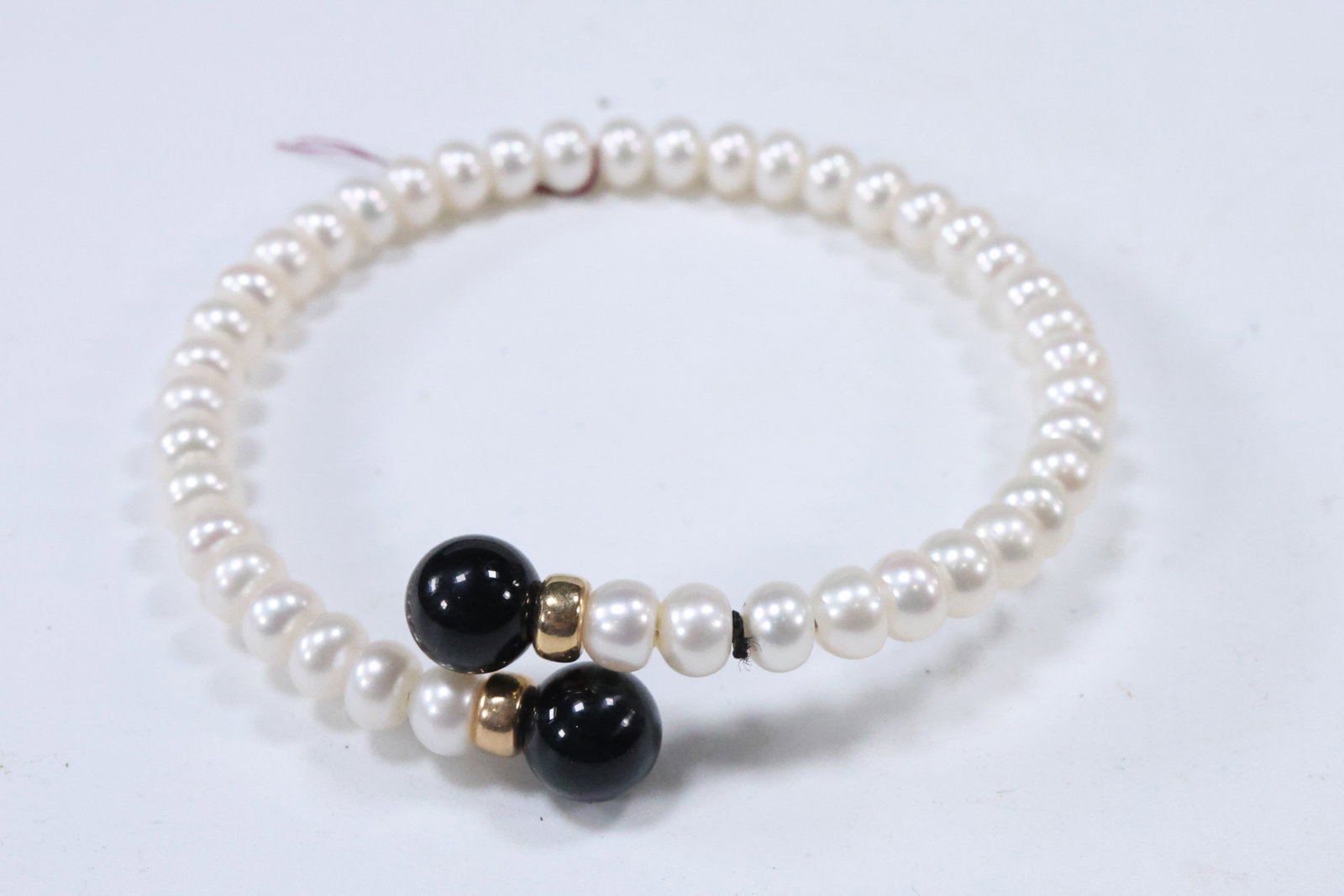 Genuine Freshwater Cultivated Pearls with Black Onyx and [2] 14K Gold Beads Bracelet 2 1/2 in.: Genuine Freshwater Cultivated Pearls with Black Onyx and [2] 14K Gold Beads Bracelet 2 1/2 in.
