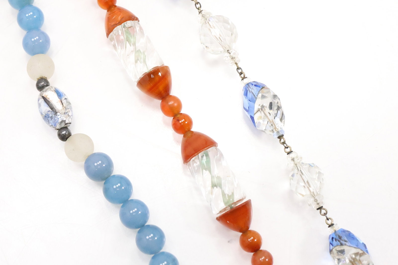 [3] Vintage Crystal Beads Blue / Clear Necklace 18 in.; Vintage Amber Glass Beads with Clear: [3] Vintage Crystal Beads Blue / Clear Necklace 18 in.; Vintage Amber Glass Beads with Clear Tubular and Round Beads Necklace 14 in. with Sterling Clasp; Vintage Blue Milk Glass Beads with Foil Beads 