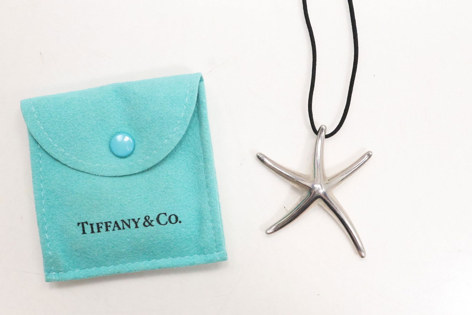 TIFFANY & CO .925 Sterling Silver Spain ELSA PERETTI "Star Fish" Pendant Necklace on 20 in. Cord (1 of 8)