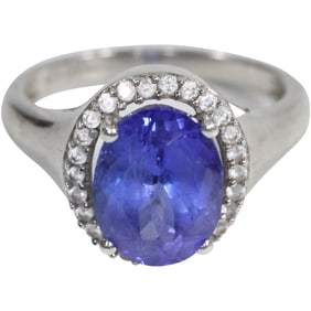 DK .925 Sterling Silver with Tanzanite Center Stone Surrounded by White Topaz Ring Size 6.25