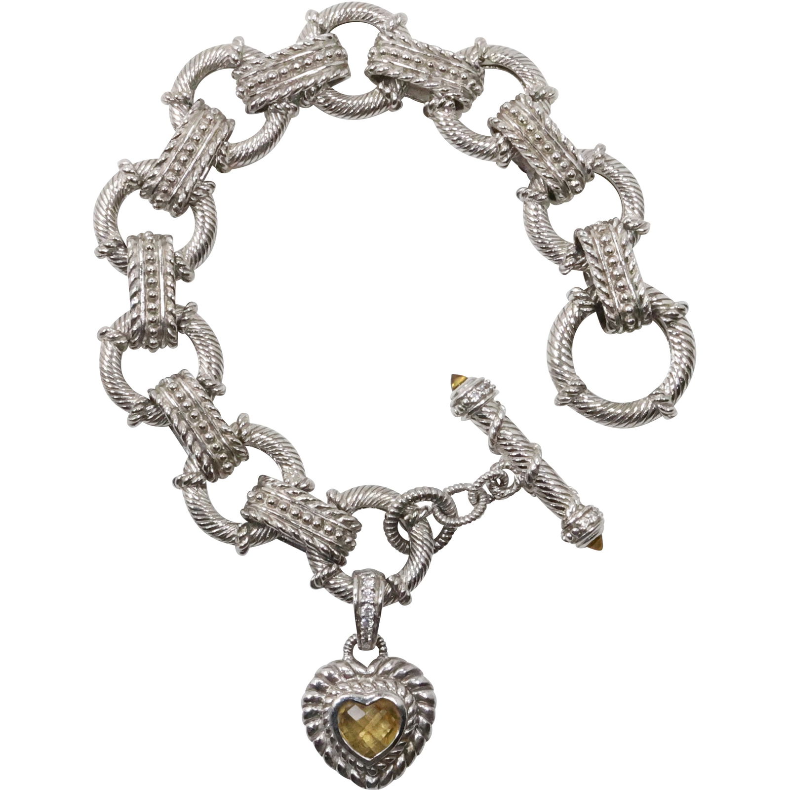 .925 Sterling Silver CZ Judith Ripka Rope Twist Link 5 with Heart Pendant having Citrine Stone: .925 Sterling Silver CZ Judith Ripka Rope Twist Link 5 with Heart Pendant having Citrine Stone. size: 7 1/2 in. x 3/4 in. ; heart 1 1/8 in. x 3/4 in.