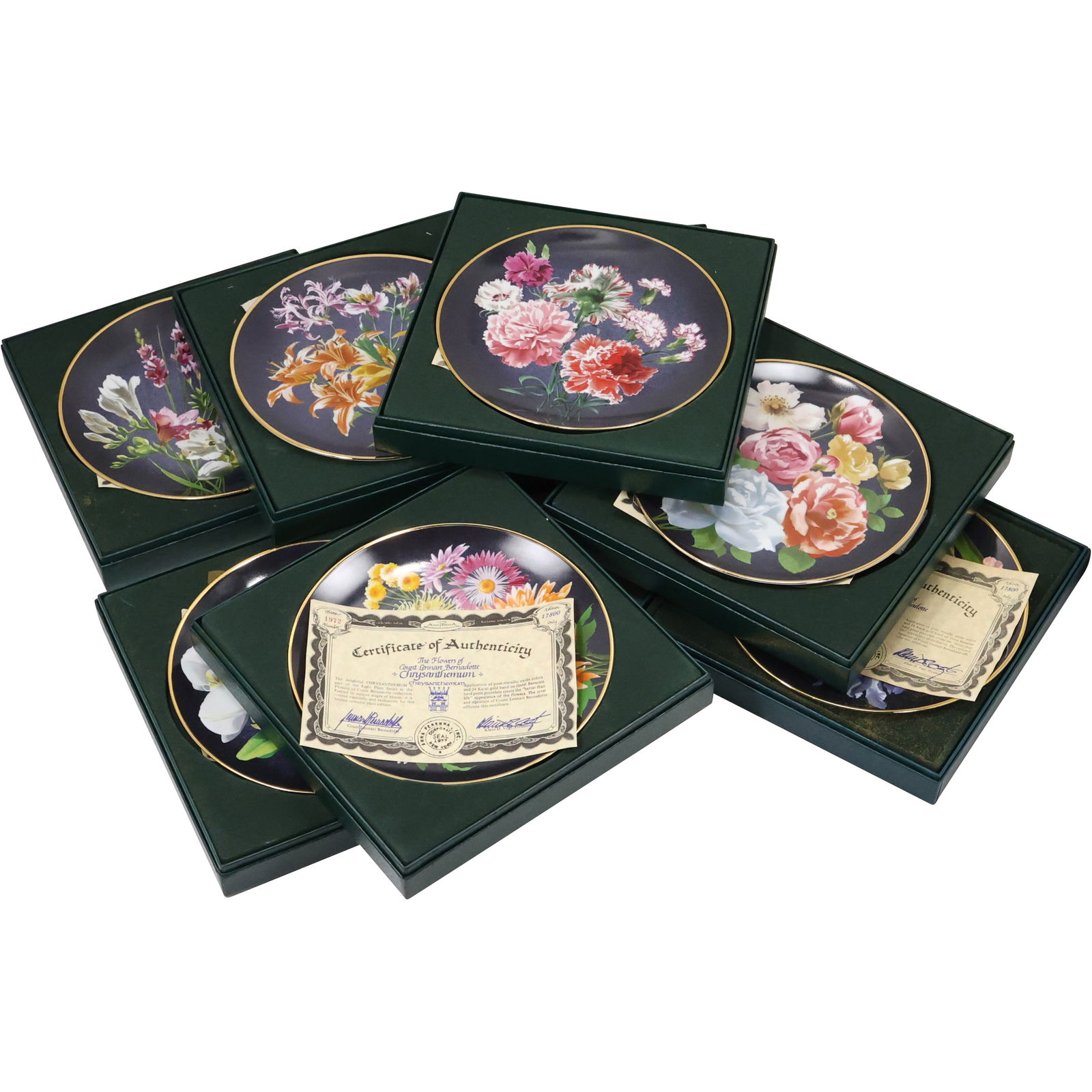 Set of 8 Limited Edition Floral Collector Plates - Count Lennart Bernadotte with Boxes & COAs: A beautiful set of 8 limited edition floral collector plates designed by Count Lennart Bernadotte. Each plate showcases a unique, vibrant floral design bordered with elegant gold accents. This collect