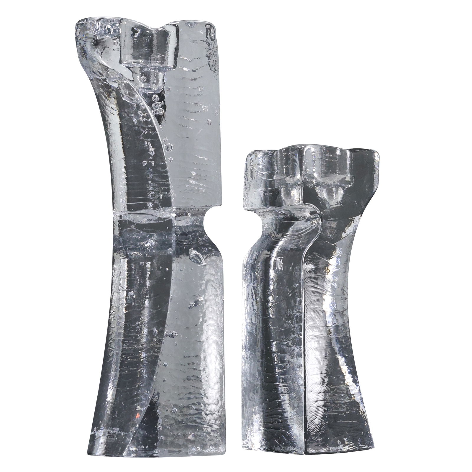pair of Kosta Boda "Heart Connect" candlesticks, designed by renowned glass artist Kjell Engman: This pair of Kosta Boda "Heart Connect" candlesticks, designed by renowned Swedish glass artist Kjell Engman, embodies elegance and modern artistry. Crafted from high-quality clear art glass, these ca