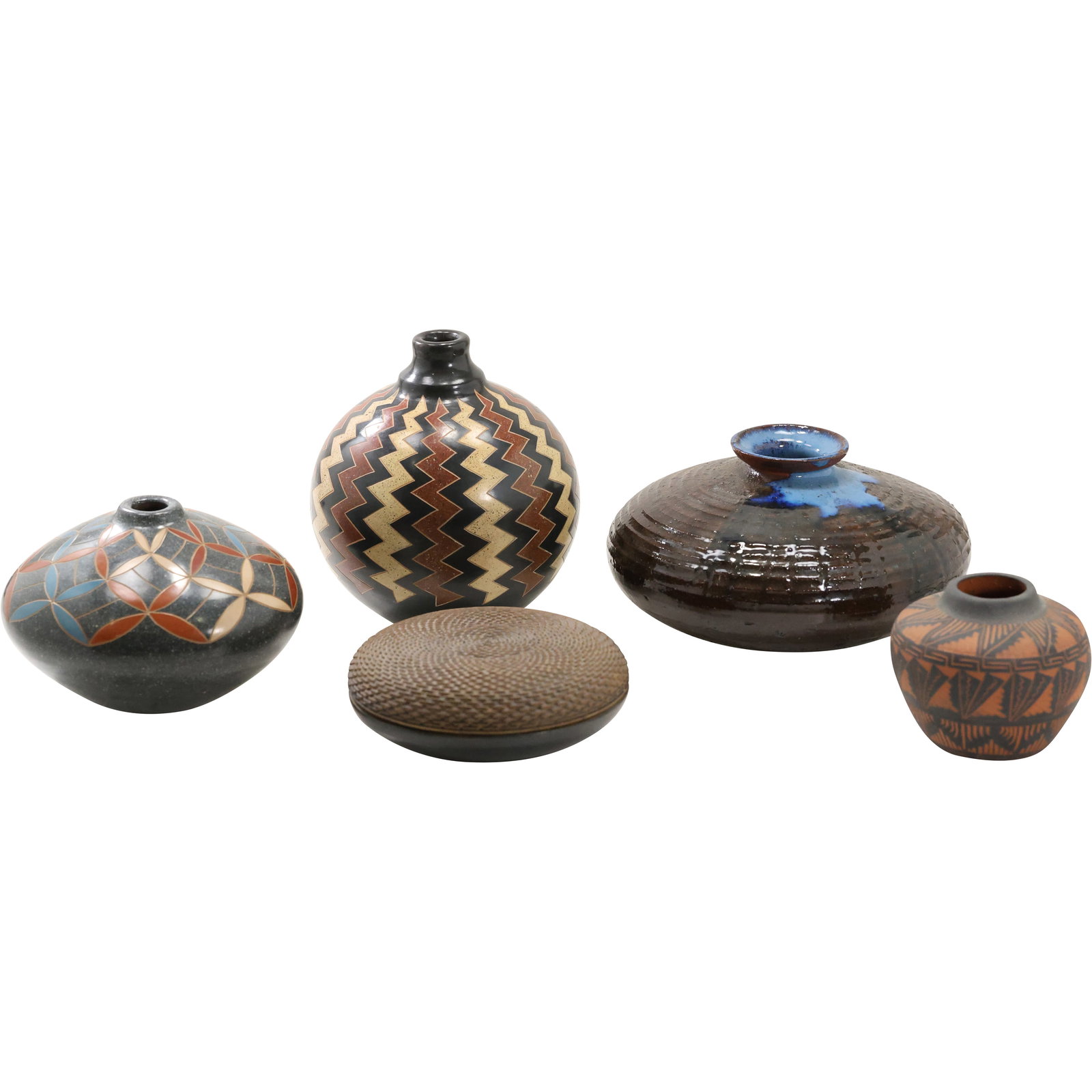 5 Assorted Pieces of Southwestern and South American Pottery Vases / Vessels 3.5 in. to 6.5 in.: Set of 5 Assorted Southwestern and South American Pottery Vases/Vessels This curated collection of five pottery pieces showcases the artistry and craftsmanship inspired by Southwestern and South Ameri