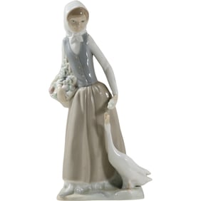 Nao by Lladro Woman Feeding Duck Porcelain Figurine Made In Spain, 9.5 in. height