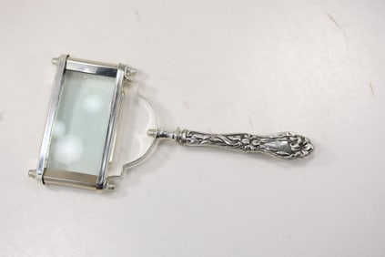 Fancy Silver Handled Magnifying Glass 10.25 in. length x 5 in. wide