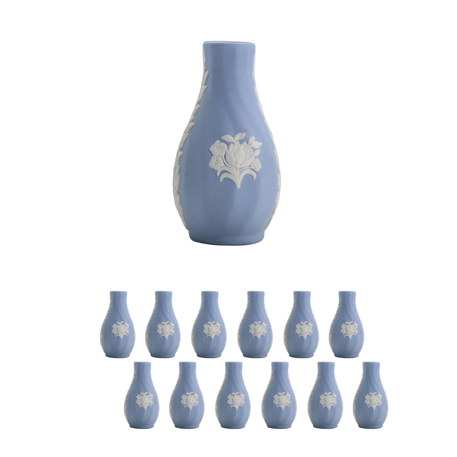 12 Matching WEDGWOOD Table Top Bud Vases with individual boxes included: 12 Matching WEDGWOOD Table Top Bud Vases with individual boxes included. size: 3 h ,