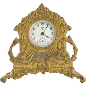 WATERBURY CLOCK CO. Small Cast Metal French Baroque Clock 5.5 in. height x 5.75 in. wide