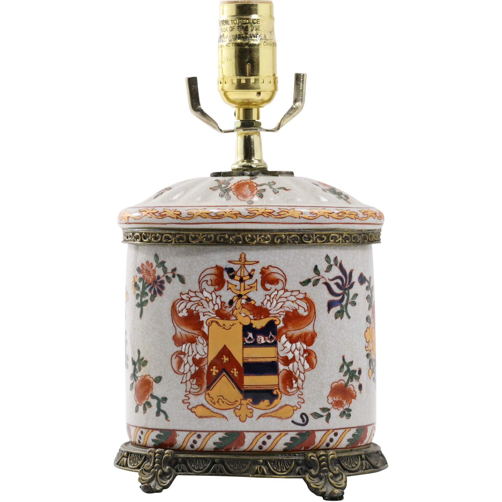 OVAL PORCELAIN ORMOLU LAMP with COAT OF ARMS AND FLORAL MOTIF 11.5 in.: OVAL PORCELAIN ORMOLU LAMP with COAT OF ARMS AND FLORAL MOTIF 11.5 in. size: 11.5 x 6 x 4
