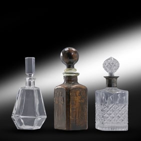 2 Vintage Liquor Decanters:[1] Leather Cased with Reief Figures, [2] Crystal Glass with Stoppers